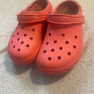 Fur lined crocs wore as house slippers with socks